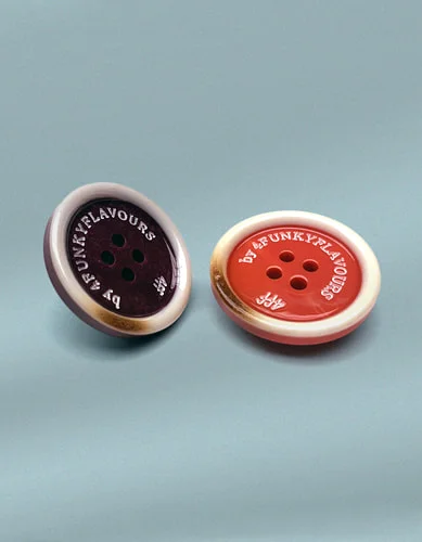 Branded sew-on buttons for clothing.
