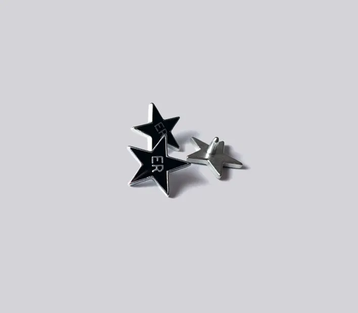 Die-cast star shaped branded rivet with colour infill.
