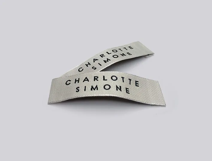 Satin woven labels for womens clothing brand.