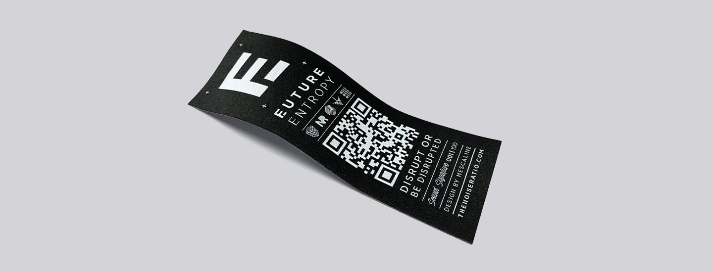 Woven label with QR code for branding garments.