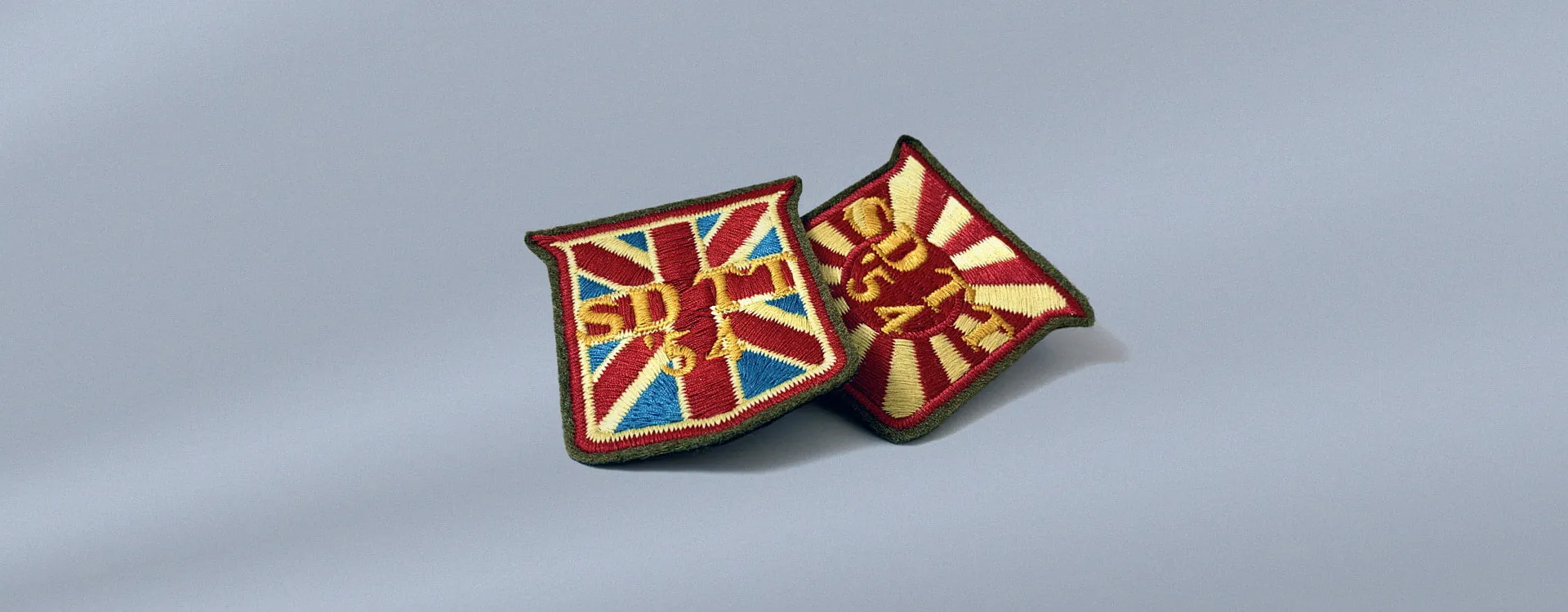 Custom fabric clothing badges. Custom fabric clothing badges.