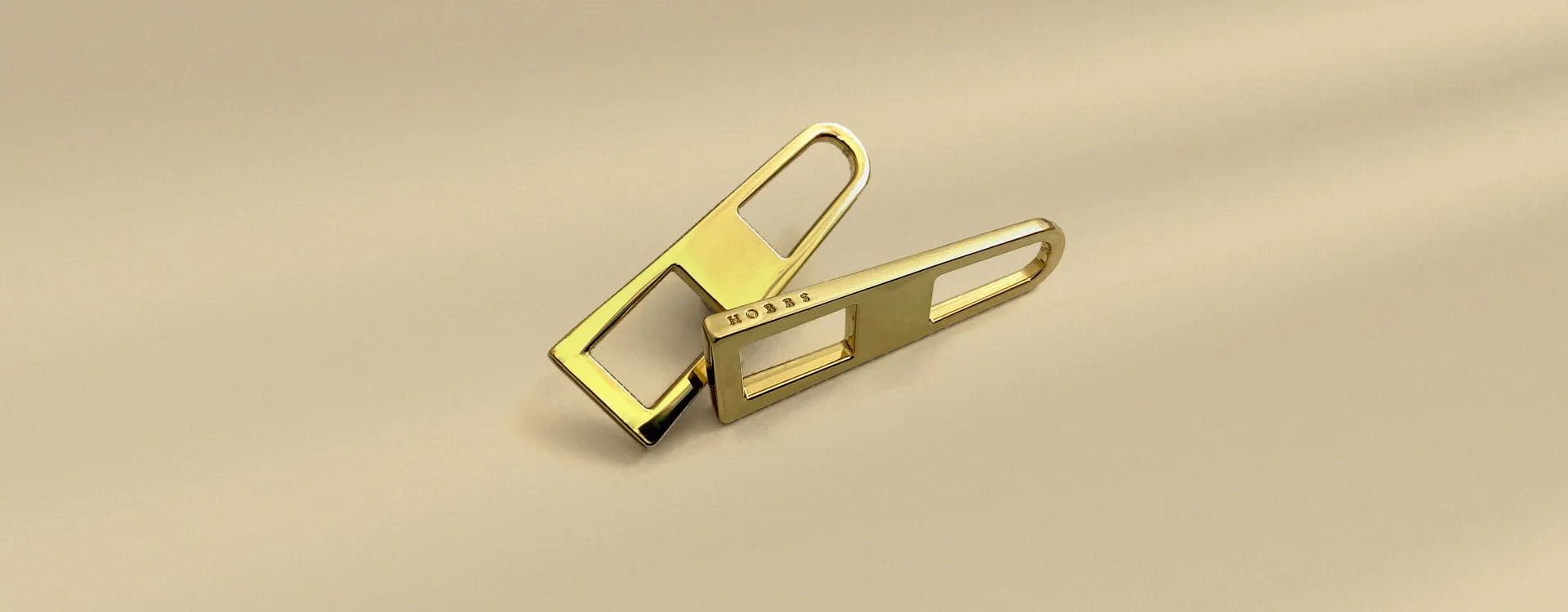 Custom zipper pulls for apparel Custom zipper pulls for branding clothing