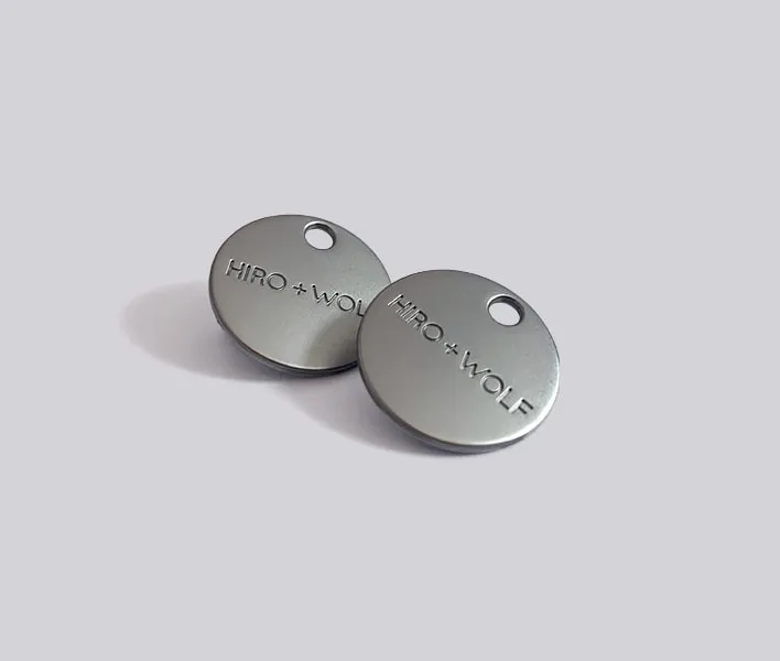 Engraved metal sew-on decals