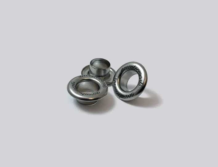 Metal eyelets with screenprinted logo.