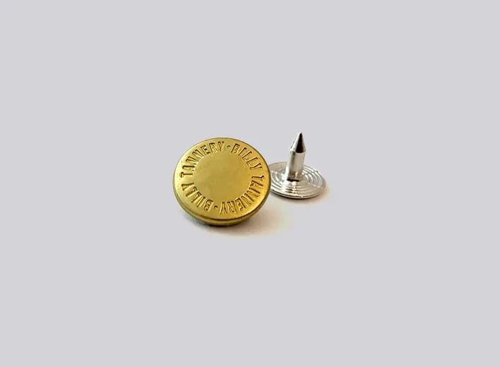 Die-cast branded rivet with engraved logo.