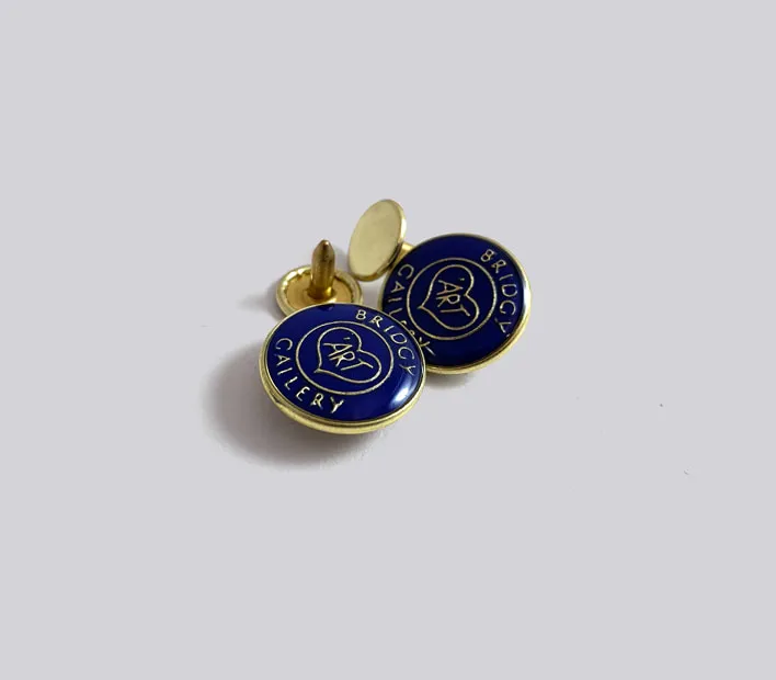 Epoxy coated branded-metal-cord-end rivet with colour infill.