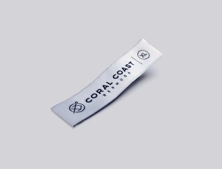 Woven label with size option for clothing.
